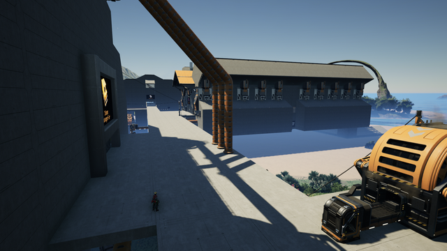 View of the Heavy Oil Refinery from the Diluted Fuel Facility. An AWESOME sink can be seen in the foreground. At the end of the road is the Empty Canister Factory.