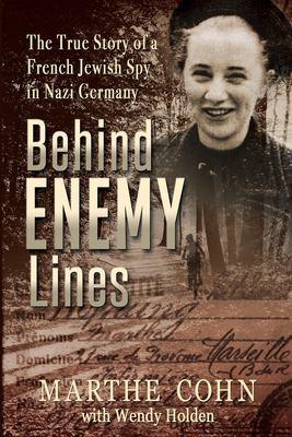Book cover for "Behind Enemy Lines: The True Story of a French Jewish Spy in Nazi Germany" by Marthe Cohn and Wendy Holden. A young woman's smiling face, that of Marthe Cohn, is in one corner. A woman riding a bike through the forest is in the background. Book title and tagline take up most of the left side. Mostly sepia color.