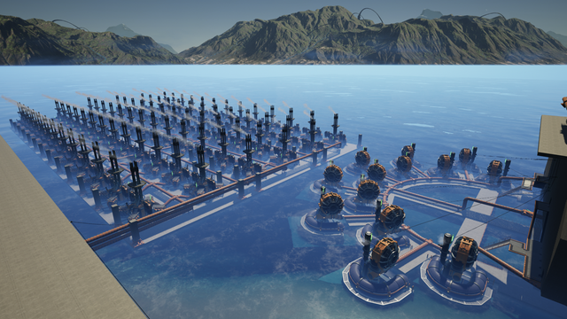 A semicircle of thirteen water extractors supply the diluted fuel facility which in turn fuels the 78 generators laid out in the background.
