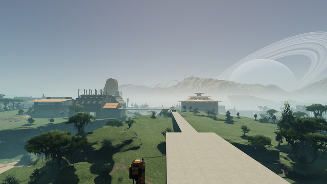 A view of the Green Fields with the new copper processing on the left, the battery silo on the right, and a couple of other buildings in the distance.
