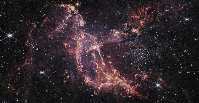 In diesem Bild von NASA’s James Webb Space Telescope Near-Infrared Camera (NIRCam) ist  NGC 346 - ein Sternhaufen innerhalb der Galaxie Kleine Magellansche Wolke - 200.000 Lichtjahre entfernt./Science: NASA, ESA, CSA, Olivia C. Jones (UK ATC), Guido De Marchi (ESTEC), Margaret Meixner (USRA). Image Processing: Alyssa Pagan (STScI), Nolan Habel (USRA), Laura Lenkić (USRA), Laurie E. U. Chu (NASA Ames).