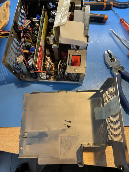 Cleaning and checking inside the power supply.