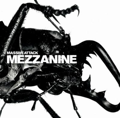 Close up of a black beetle on a white background. with the title of the album and the name of the band in white on the beetle.