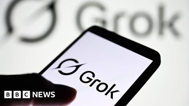 Grok logo displayed on a smartphone, with it's logo shown on a blurred, larger backdrop behind it.