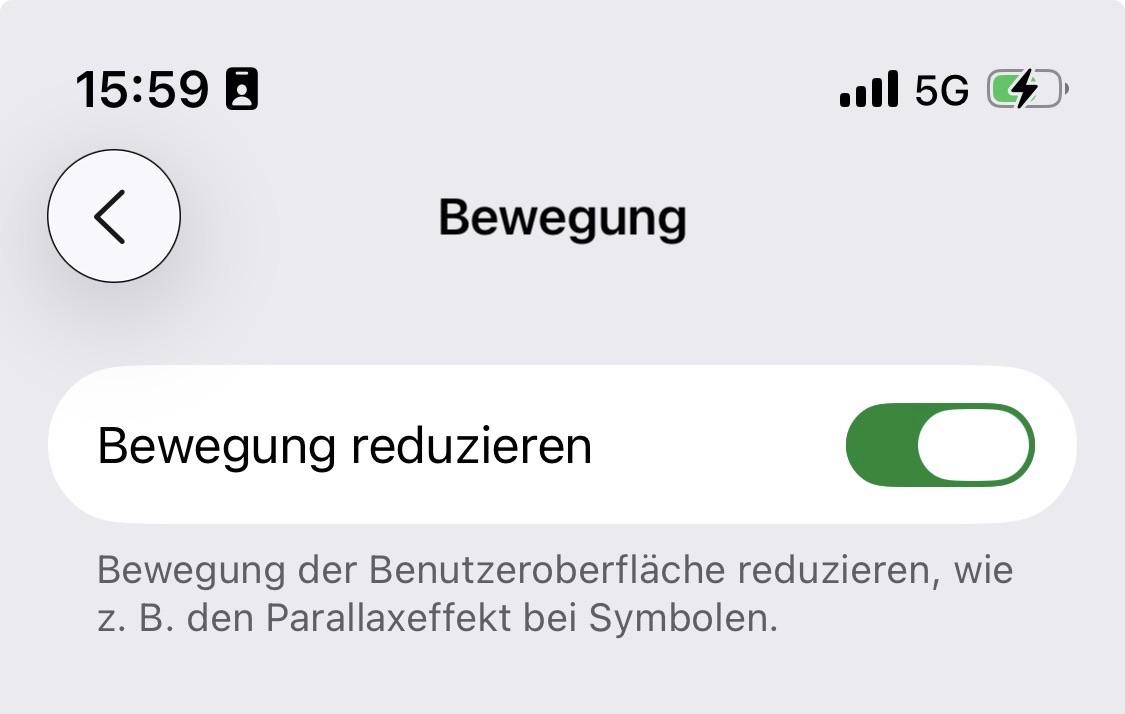 Ein Schnittstellen-Screenshot mit einer Funktion mit der Bezeichnung "Bewegung" mit der Option zum Ein- oder Ausschalten von "Bewegung reduzieren". Der folgende Text erklärt, dass dies die Bewegungseffekte der Benutzeroberfläche wie Parallax-Effekte reduziert
